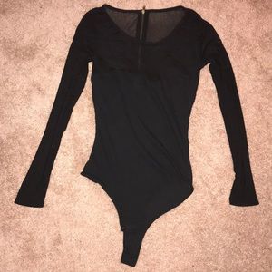 A black half mesh onesie top
